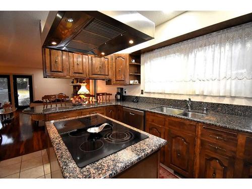 105 Mcpherson Square Square, Hinton, AB - Indoor Photo Showing Kitchen With Double Sink