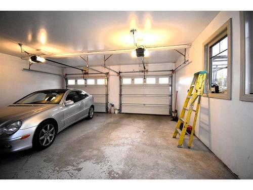 105 Mcpherson Square Square, Hinton, AB - Indoor Photo Showing Garage