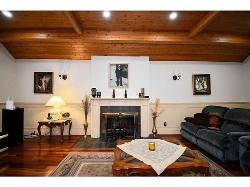 105 Mcpherson Square Square, Hinton, AB - Indoor Photo Showing Living Room With Fireplace