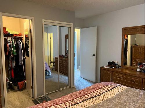 708 8 Street, Fox Creek, AB - Indoor Photo Showing Bedroom