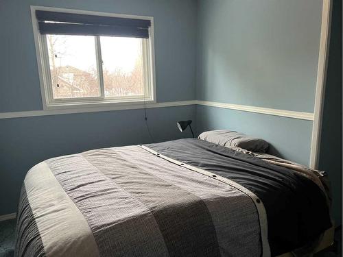 708 8 Street, Fox Creek, AB - Indoor Photo Showing Bedroom