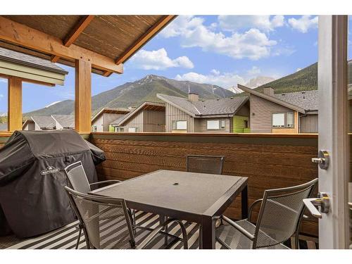 301B-209 Stewart Creek Rise, Canmore, AB - Outdoor With Deck Patio Veranda With Exterior