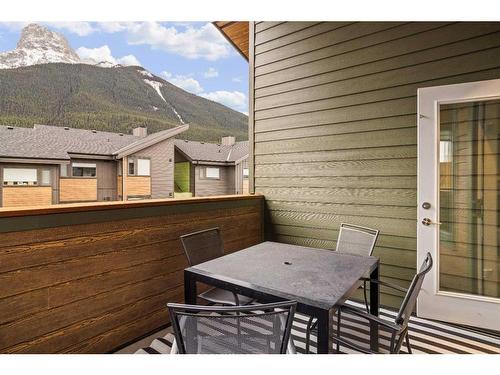 301B-209 Stewart Creek Rise, Canmore, AB - Outdoor With Deck Patio Veranda With Exterior