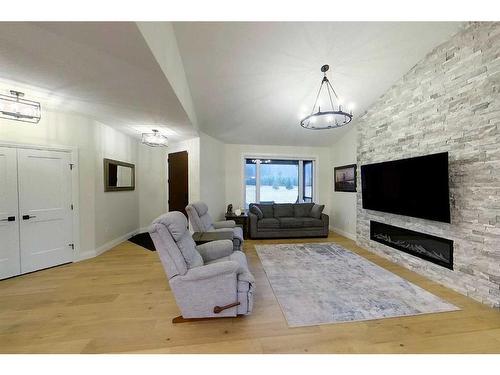 37-16511 Township Road 532A, Rural Yellowhead County, AB - Indoor Photo Showing Living Room With Fireplace