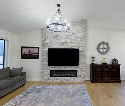 37-16511 Township Road 532A, Rural Yellowhead County, AB - Indoor Photo Showing Living Room With Fireplace