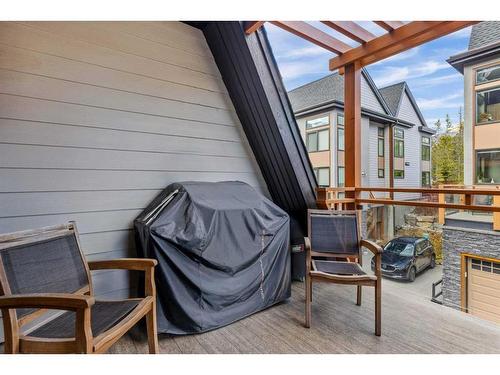 701-102 Stewart Creek Rise, Canmore, AB - Outdoor With Deck Patio Veranda With Exterior