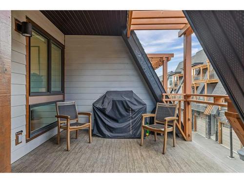 701-102 Stewart Creek Rise, Canmore, AB - Outdoor With Deck Patio Veranda With Exterior