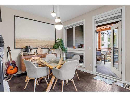 701-102 Stewart Creek Rise, Canmore, AB - Indoor Photo Showing Dining Room