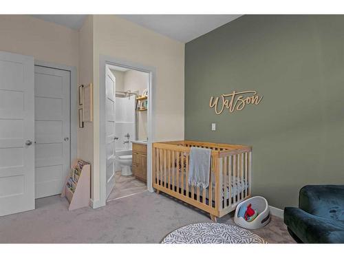 701-102 Stewart Creek Rise, Canmore, AB - Indoor Photo Showing Bedroom