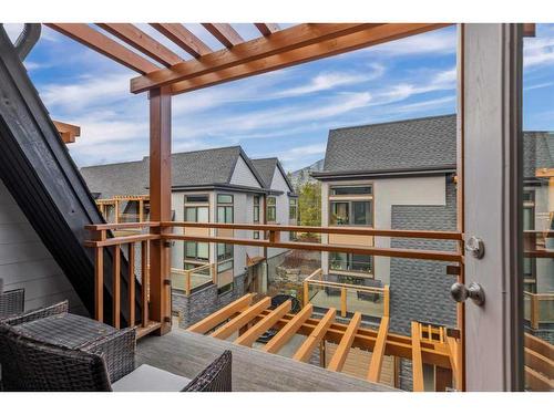 701-102 Stewart Creek Rise, Canmore, AB - Outdoor With Deck Patio Veranda With Exterior