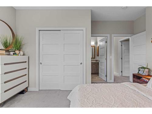 701-102 Stewart Creek Rise, Canmore, AB - Indoor Photo Showing Bedroom