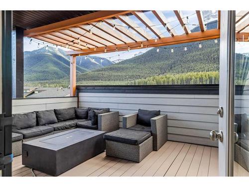 701-102 Stewart Creek Rise, Canmore, AB - Outdoor With Deck Patio Veranda With Exterior