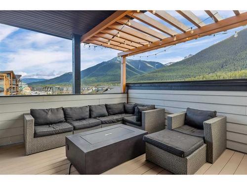 701-102 Stewart Creek Rise, Canmore, AB - Outdoor With Deck Patio Veranda With Exterior