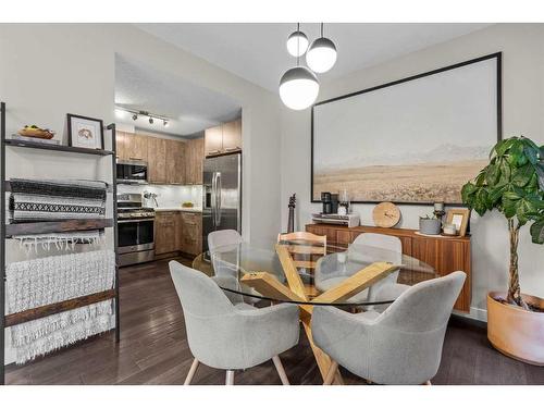 701-102 Stewart Creek Rise, Canmore, AB - Indoor Photo Showing Dining Room