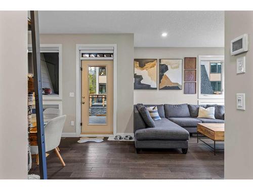 701-102 Stewart Creek Rise, Canmore, AB - Indoor Photo Showing Living Room