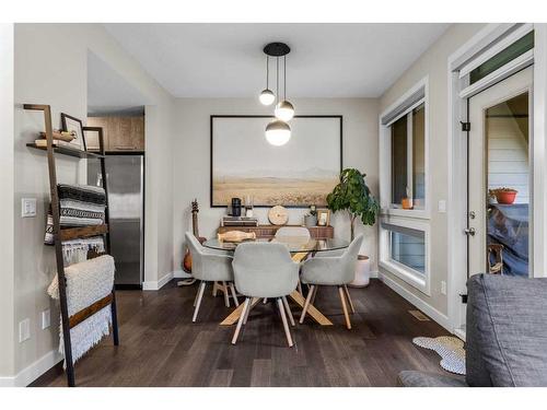 701-102 Stewart Creek Rise, Canmore, AB - Indoor Photo Showing Dining Room