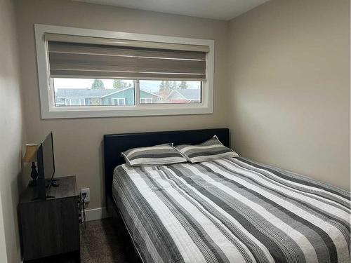 510 4 Avenue, Fox Creek, AB - Indoor Photo Showing Bedroom