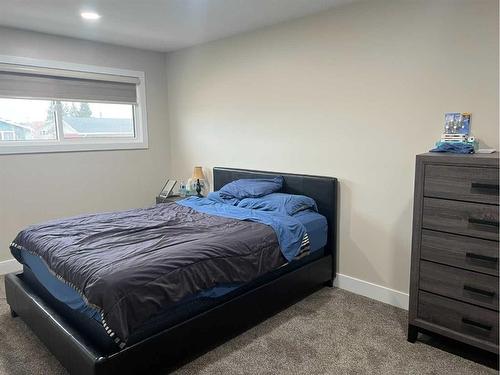 510 4 Avenue, Fox Creek, AB - Indoor Photo Showing Bedroom