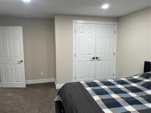 510 4 Avenue, Fox Creek, AB - Indoor Photo Showing Bedroom