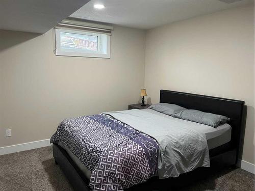 510 4 Avenue, Fox Creek, AB - Indoor Photo Showing Bedroom