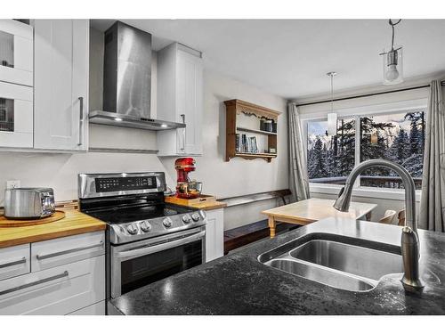 922 Lawrence Grassi Ridge, Canmore, AB - Indoor Photo Showing Kitchen With Double Sink