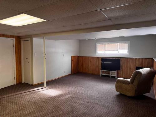 208 Slade Drive, Nanton, AB - Indoor Photo Showing Basement