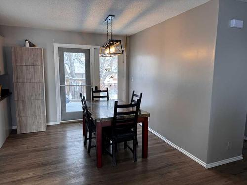 208 Slade Drive, Nanton, AB - Indoor Photo Showing Dining Room