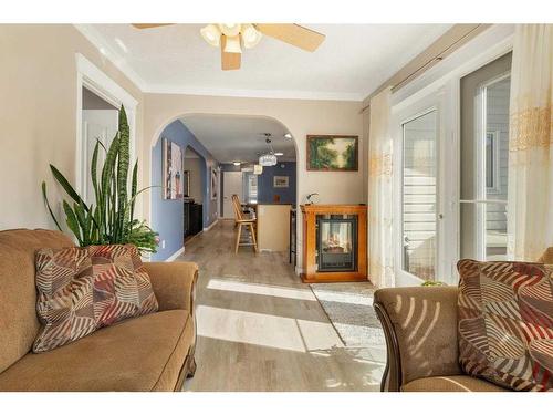 284 Eaton Drive, Hinton, AB - Indoor Photo Showing Living Room With Fireplace