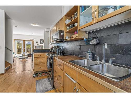 150-901 Benchlands Trail Nw, Canmore, AB - Indoor Photo Showing Kitchen With Double Sink