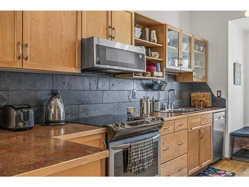 150-901 Benchlands Trail Nw, Canmore, AB - Indoor Photo Showing Kitchen With Double Sink