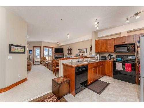 207-155 Crossbow Place, Canmore, AB - Indoor Photo Showing Kitchen