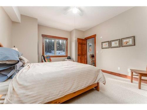 207-155 Crossbow Place, Canmore, AB - Indoor Photo Showing Bedroom