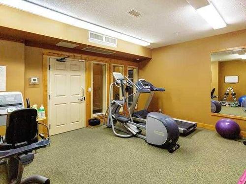 207-155 Crossbow Place, Canmore, AB - Indoor Photo Showing Gym Room