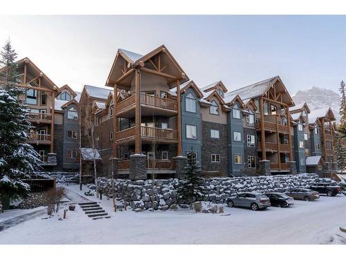 207-155 Crossbow Place, Canmore, AB - Outdoor With Facade