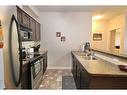 304-109 Seabolt Drive, Hinton, AB  - Indoor Photo Showing Kitchen With Double Sink 