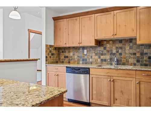 307-1002 8Th Avenue, Canmore, AB - Indoor Photo Showing Kitchen With Double Sink