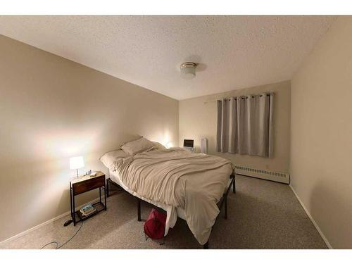 107-205 12 Avenue Sw, Slave Lake, AB - Indoor Photo Showing Bedroom