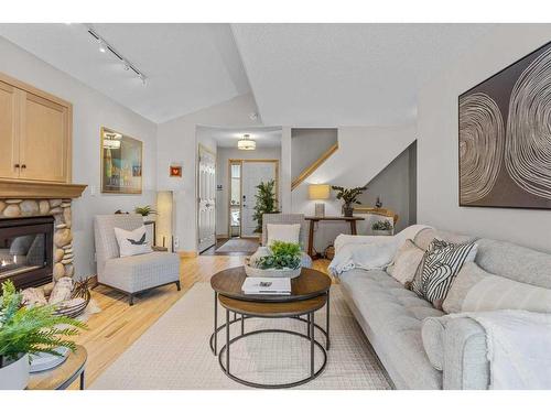 53-127 Carey, Canmore, AB - Indoor Photo Showing Living Room With Fireplace