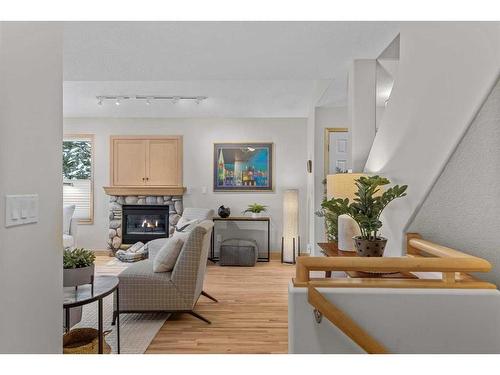 53-127 Carey, Canmore, AB - Indoor Photo Showing Living Room With Fireplace