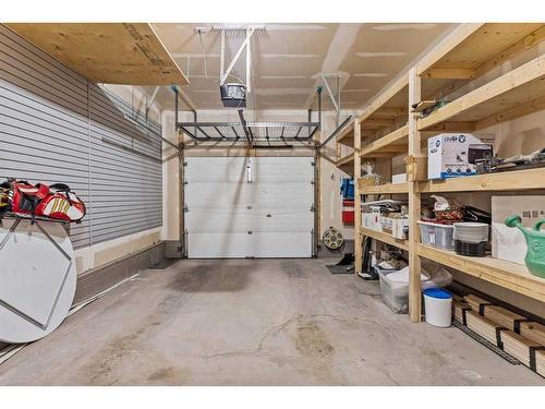 53-127 Carey, Canmore, AB - Indoor Photo Showing Garage