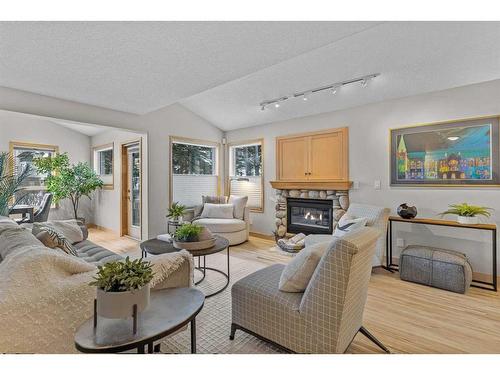 53-127 Carey, Canmore, AB - Indoor Photo Showing Living Room With Fireplace