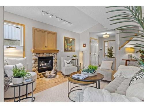 53-127 Carey, Canmore, AB - Indoor Photo Showing Living Room With Fireplace