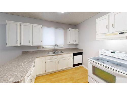 16 Chaisson Crossing, Whitecourt, AB - Indoor Photo Showing Kitchen With Double Sink