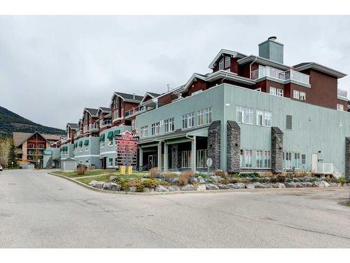 204-1151 Sidney Street, Canmore, AB - Outdoor With Facade