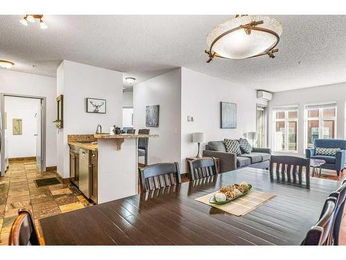 306-1151 Sidney Street, Canmore, AB - Indoor Photo Showing Dining Room