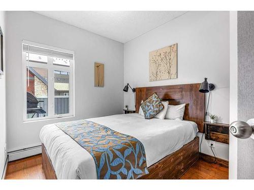 306-1151 Sidney Street, Canmore, AB - Indoor Photo Showing Bedroom