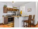 306-1151 Sidney Street, Canmore, AB  - Indoor Photo Showing Kitchen 