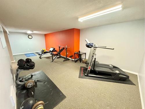 703 3 Avenue, Fox Creek, AB - Indoor Photo Showing Gym Room