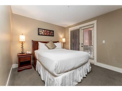 121-173 Kananaskis Way, Canmore, AB - Indoor Photo Showing Bedroom