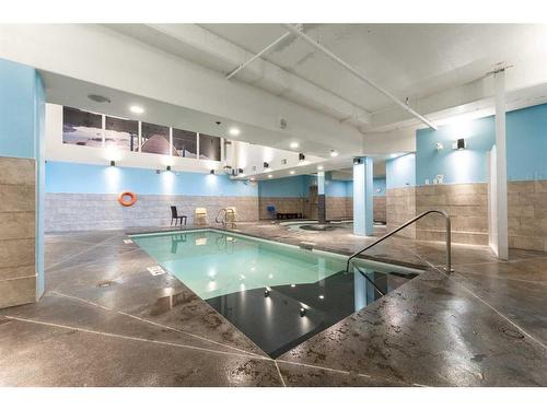 121-173 Kananaskis Way, Canmore, AB - Indoor Photo Showing Other Room With In Ground Pool